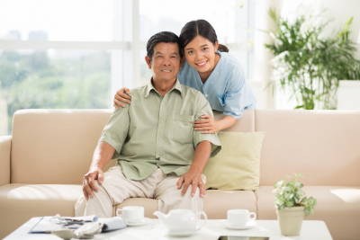 caregiver and her elderly man patient